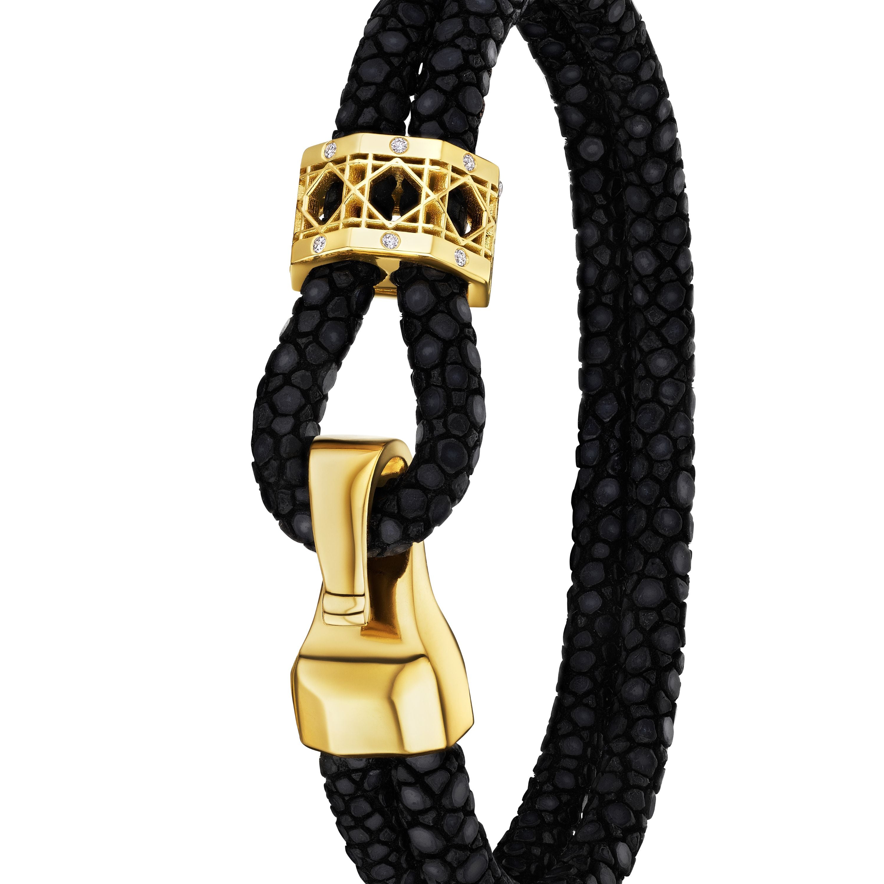 MoAnA LUU Abyss bracelet in 18K yellow gold and diamonds, featuring cane-woven work bead inspired by traditional Caribbean fish traps, reflecting the house’s vision of Creole-inspired fine jewelry crafted in New York.