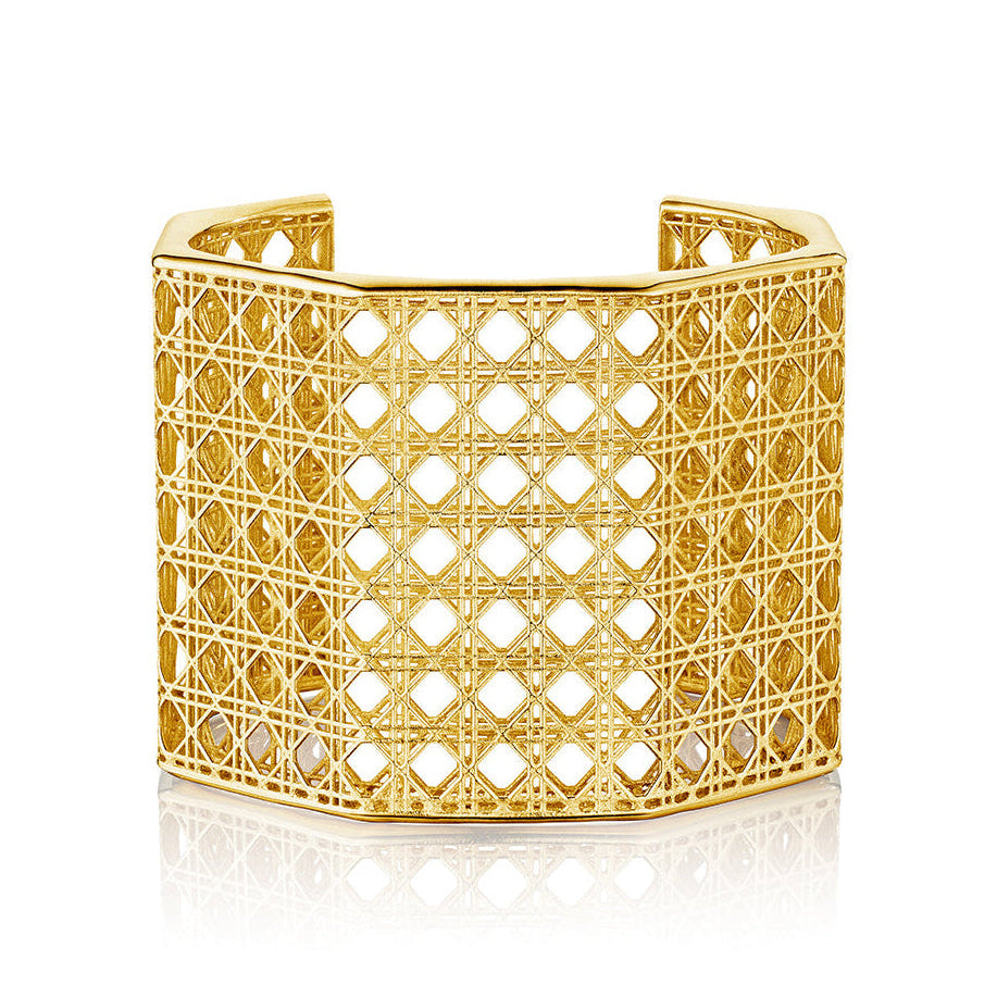 MoAnA LUU Doudou Maxi cuff bracelet in 18K yellow gold, featuring an intricate woven openwork design inspired by Caribbean fish traps.