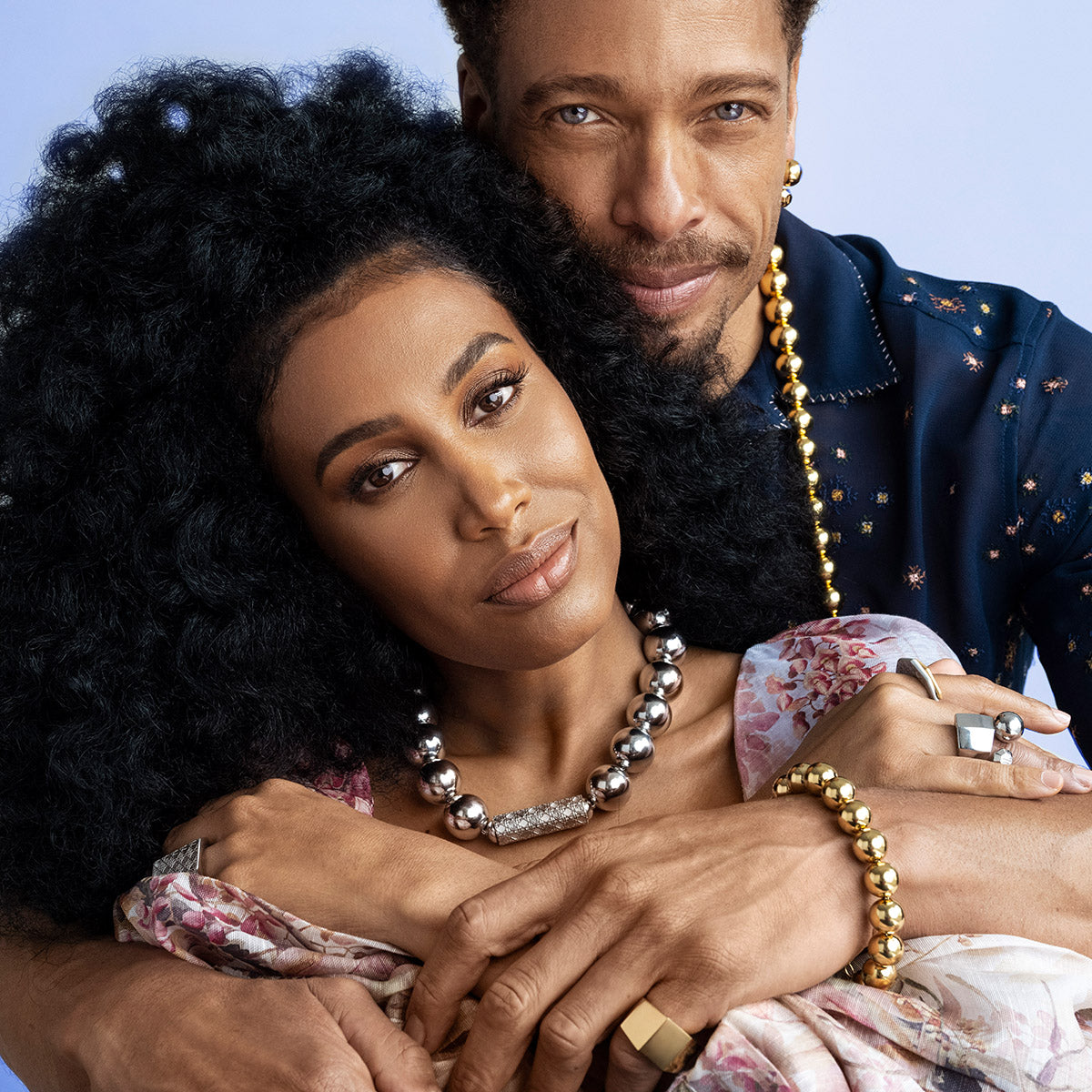 Gary Dourdan and MoAnA LUU wearing MoAnA LUU beads necklaces, embossed rings and earrings.