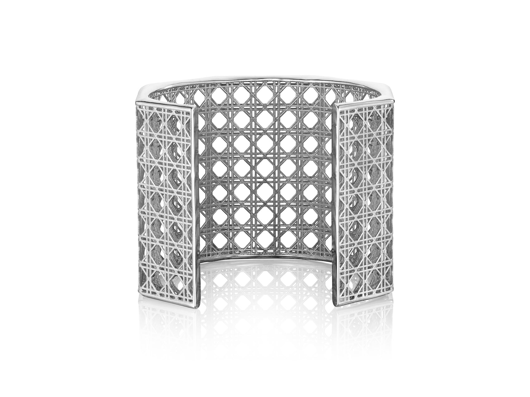 MoAnA LUU Doudou Maxi cuff bracelet in silver, featuring an intricate woven openwork design inspired by Caribbean fish traps.