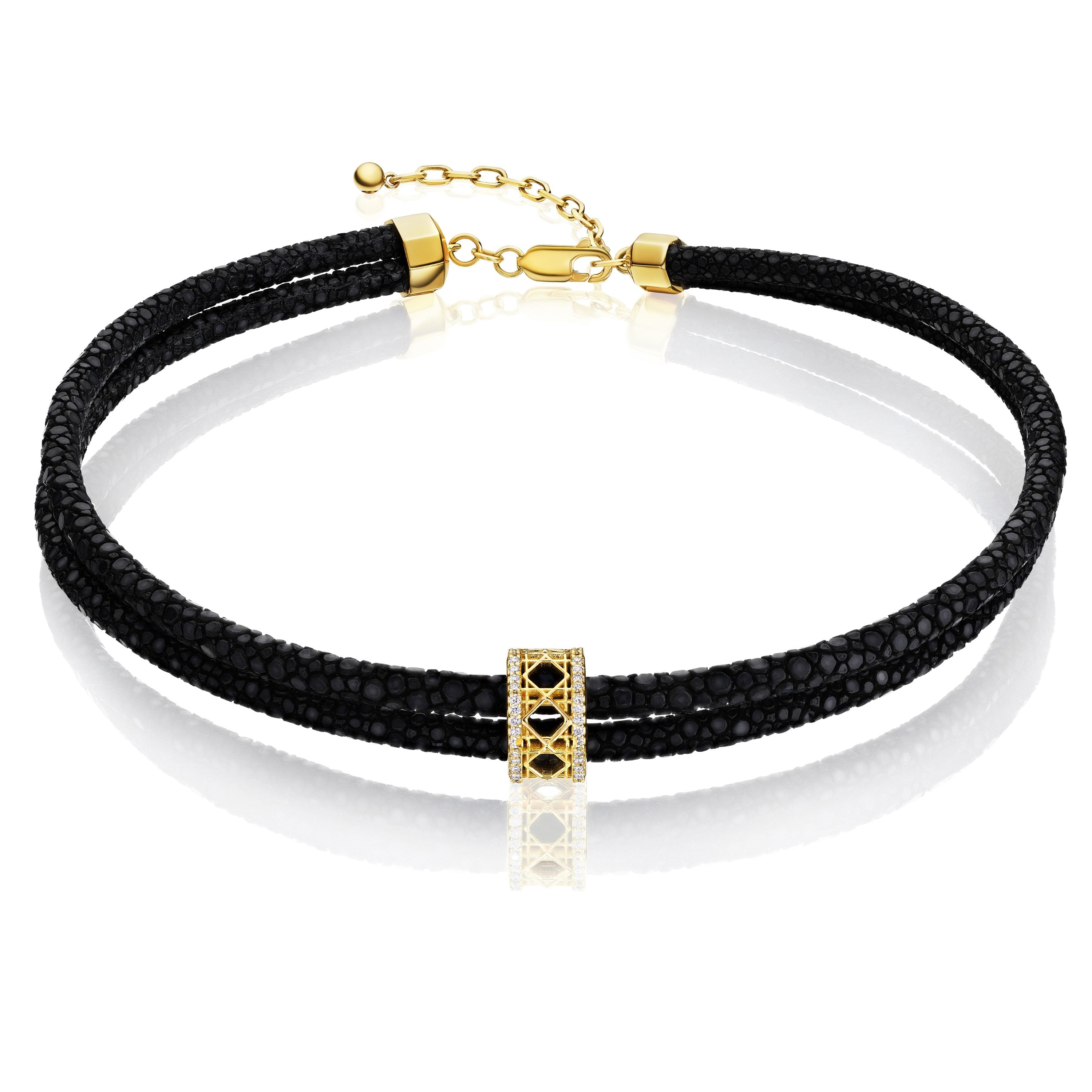 MoAnA LUU Abyss choker in stingray leather, diamonds and 18K yellow gold, featuring a cane-woven work bead inspired by traditional Caribbean fish traps, reflecting the house’s vision of Creole-inspired fine jewelry crafted in New York.