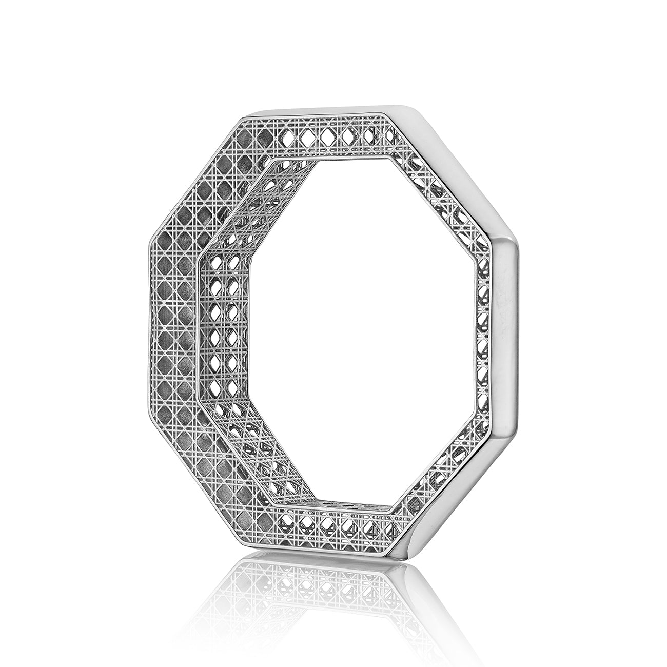 MoAnA LUU Doudou bangle bracelet in silver, featuring a cane-woven work inspired by traditional Caribbean fish traps, reflecting the house’s vision of Creole-inspired fine jewelry crafted in New York.