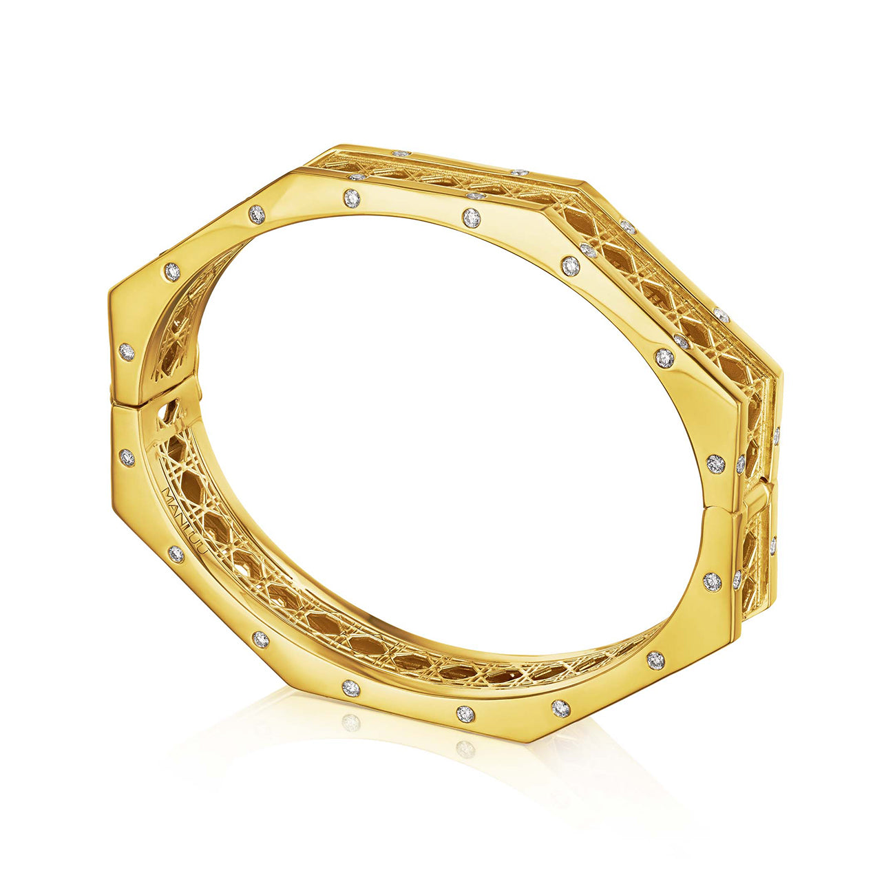 MoAnA LUU Doudou bracelet in 18K yellow gold, featuring burnish diamond boarders and  a cane-woven work inspired by traditional Caribbean fish traps, reflecting the house’s vision of Creole-inspired fine jewelry crafted in New York.