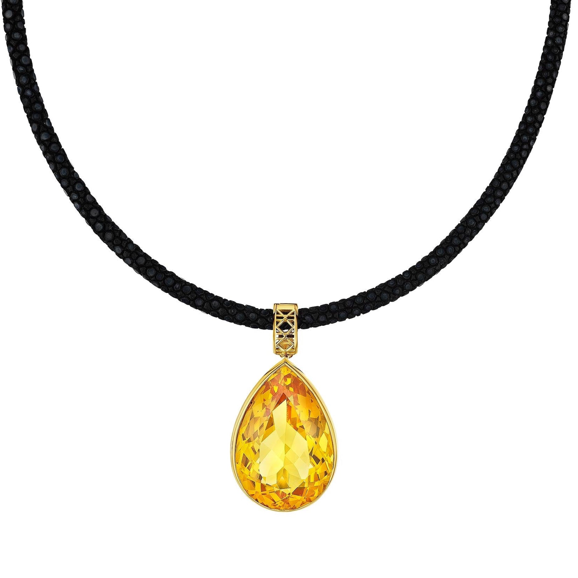 MoAnA LUU Maxi Dlo pear-shaped citrine pendant in 18K yellow gold on a black stingray leather necklace, featuring a sculptural cane-woven bail and openwork basket inspired by Caribbean fish traps.