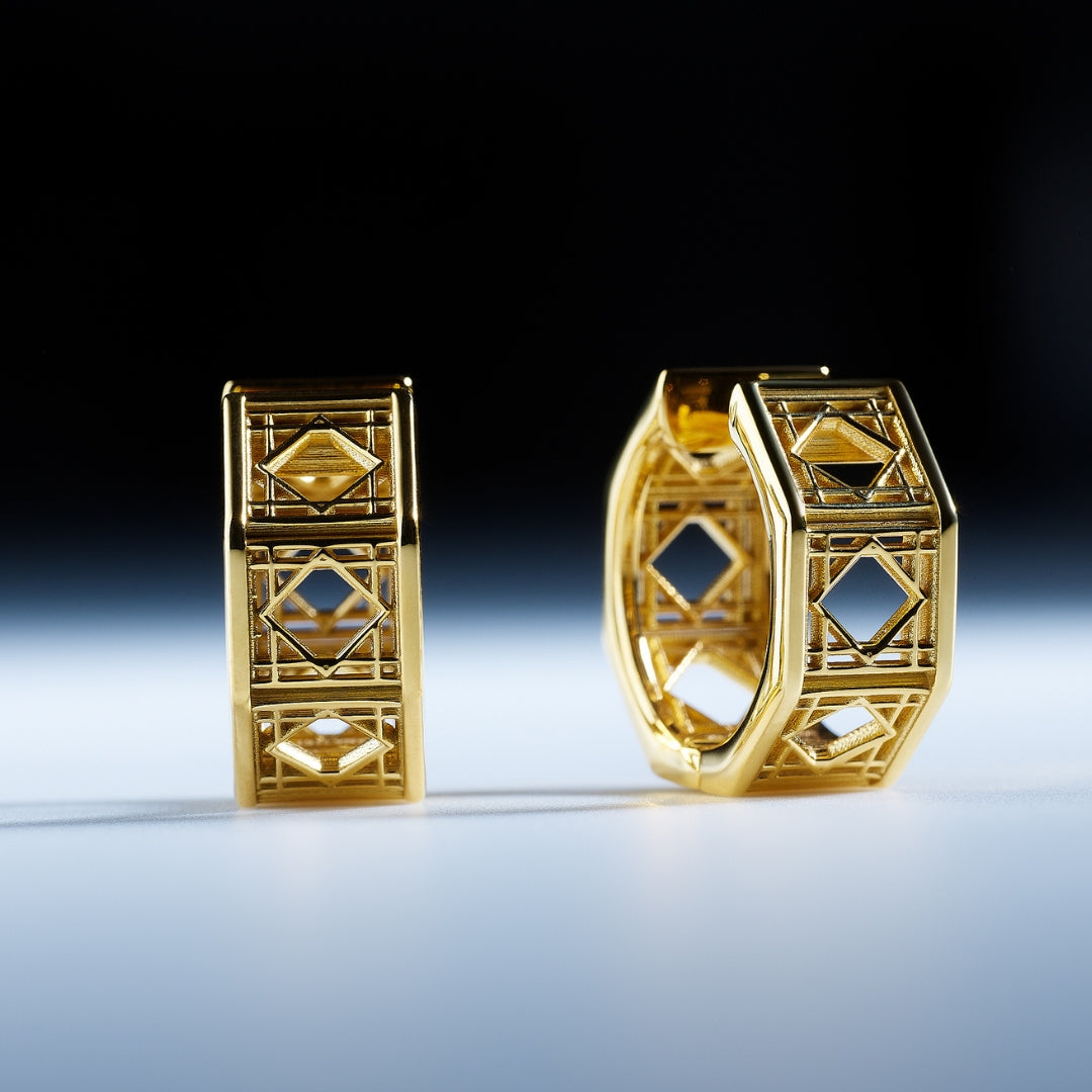 MoAnA LUU Doudou hoop earrings in 18K yellow gold, featuring geometric openwork design inspired by Caribbean fish traps.