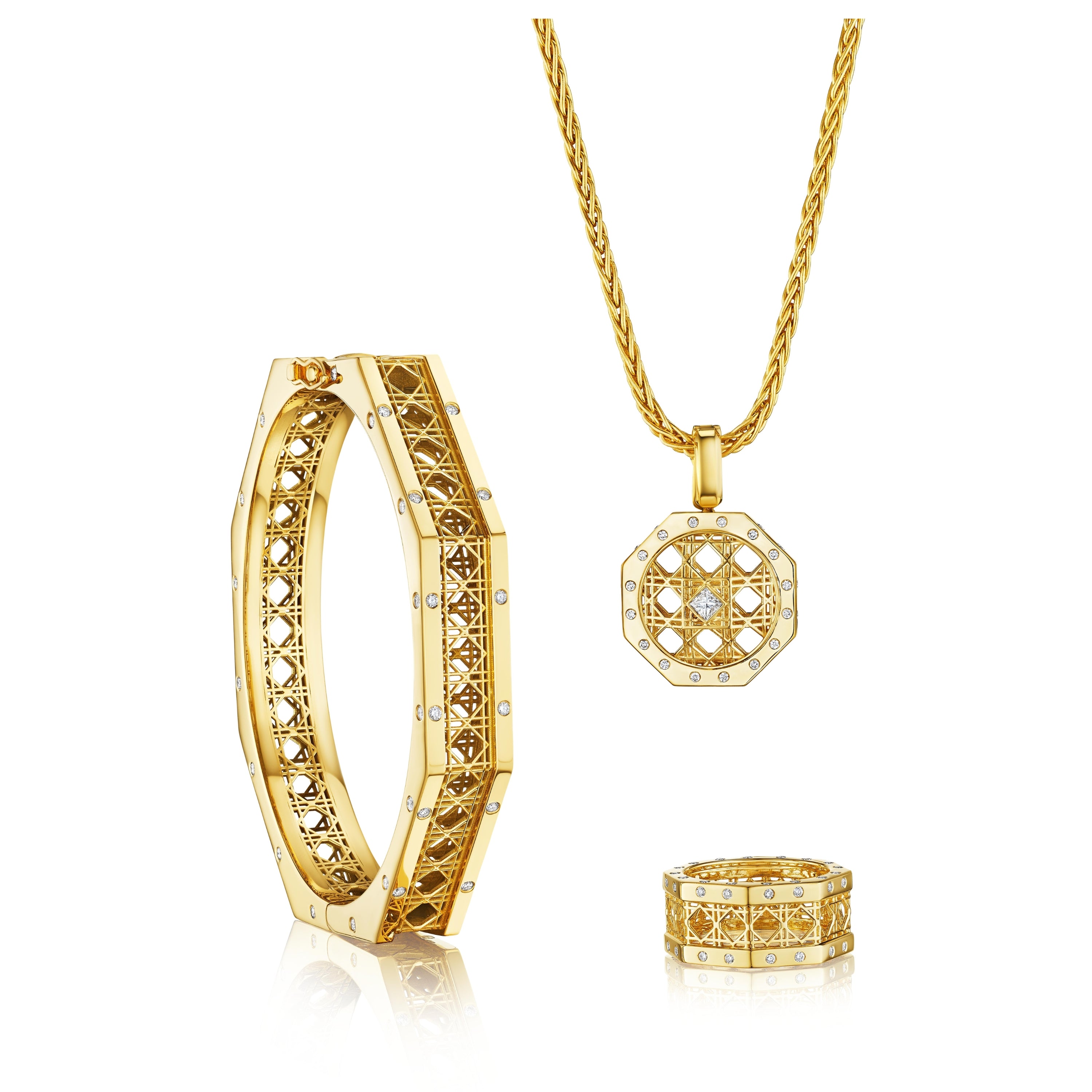 MoAnA LUU Doudou jewelry set in 18K yellow gold, featuring geometric openwork bracelet, octagonal pendant necklace, and diamond band ring inspired by Caribbean fish traps.