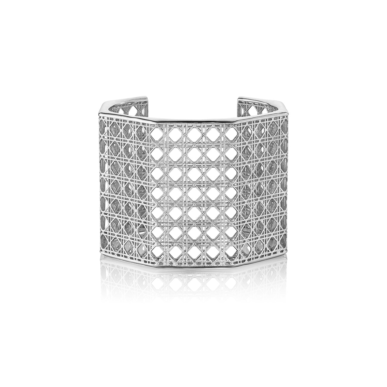 MoAnA LUU Doudou Maxi cuff bracelet  in silver, featuring an intricate woven openwork design inspired by Caribbean fish traps.