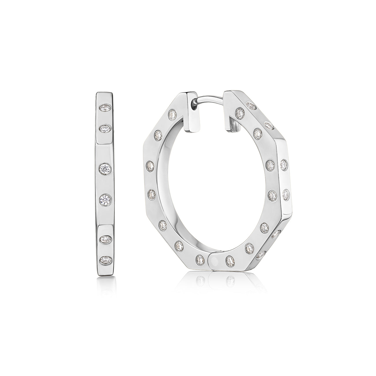 MoAnA LUU Ti hoop earrings in gold with diamond accents, featuring angular geometric design.