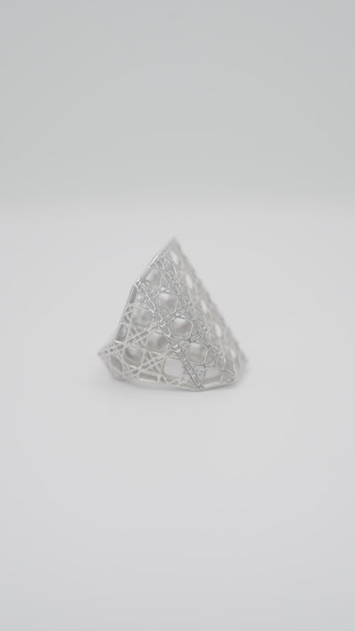 MoAnA LUU Doudou maxi ring in silver featuring a cane-woven work inspired by traditional Caribbean fish traps, reflecting the house’s vision of Creole-inspired fine jewelry crafted in New York.