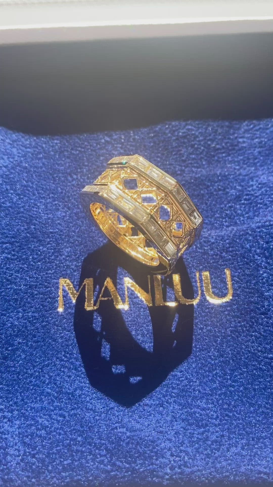 MoAnA LUU Doudou eternity bad ring in 18K yellow gold, featuring baguette diamonds in an intricate woven openwork design inspired by Caribbean fish traps.