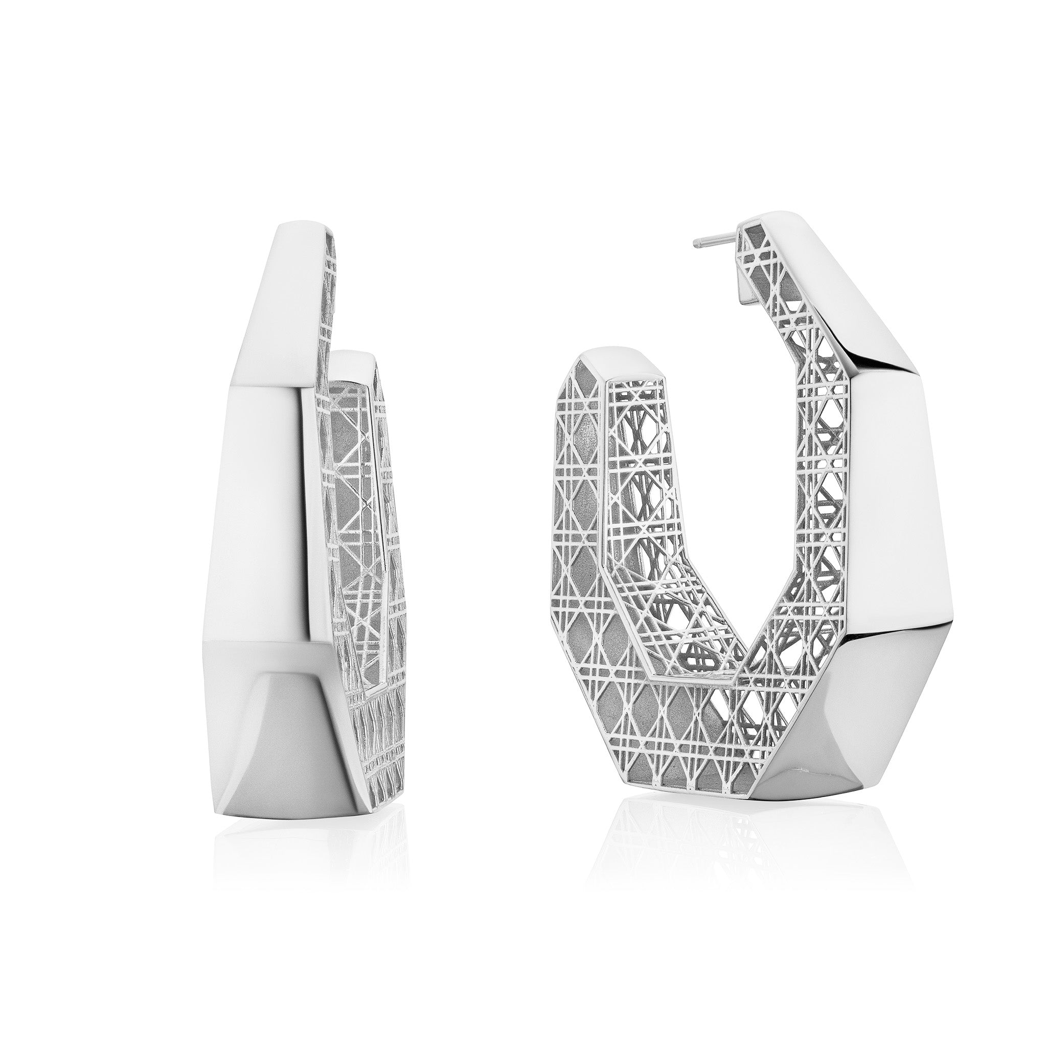MoAnA LUU Doudou Creole Mama Hoop earrings in silver, featuring a cane-woven work inspired by traditional Caribbean fish traps, reflecting the house’s vision of Creole-inspired jewelry crafted in New