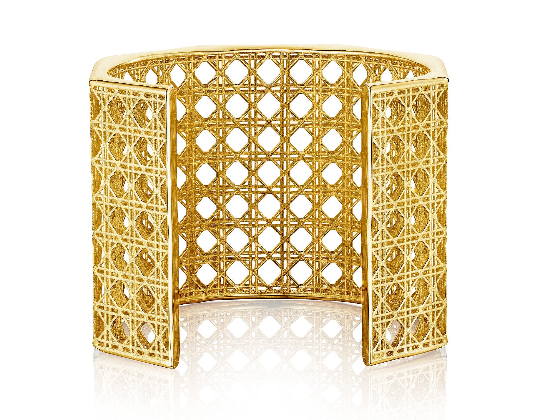 MoAnA LUU Doudou Maxi cuff bracelet  in 18K yellow gold, featuring an intricate woven openwork design inspired by Caribbean fish traps.